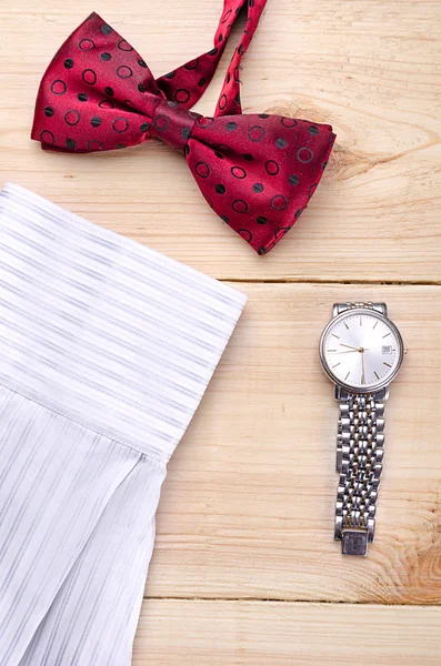 Red bow tie with watch and shirt