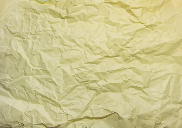 Yellow crumpled paper Close-up shot - Wrinkled paper texture for background