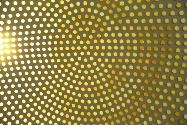 Dotted background of the colorful circles, pastel yellow geometric pattern.