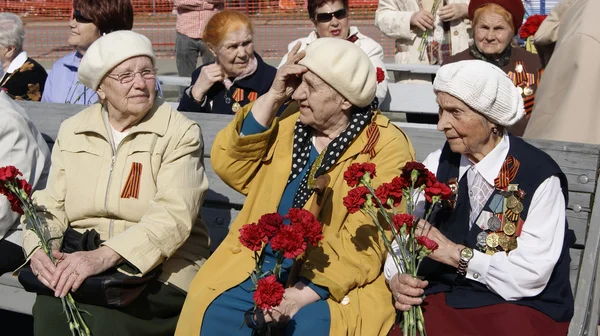 NOVOURALSK, RUSSIA - MAY, 9, 2012:  Old women - veterans of the great Patriotic War.