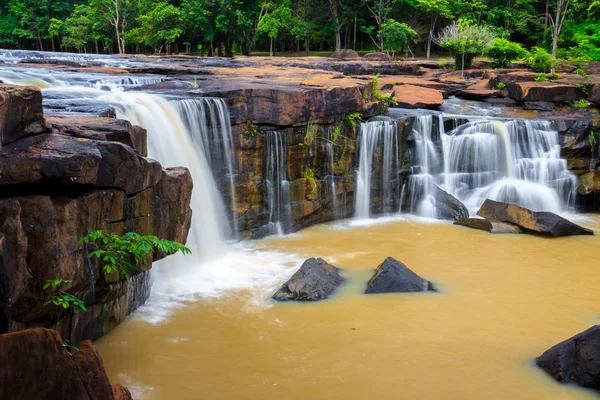 Orange waterfall of Thailand in rainny season