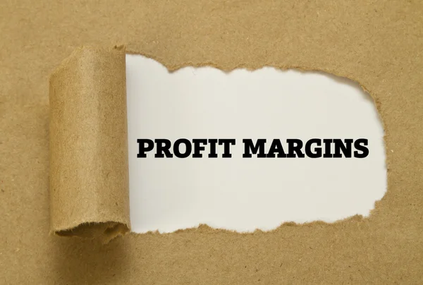 The phrase Profit Margins written under torn paper.