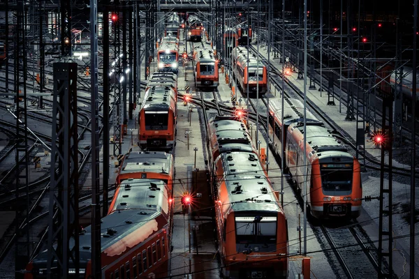 Railway station with motion train at night