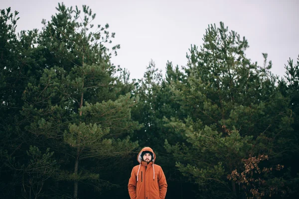 Bearded man in the winter forest