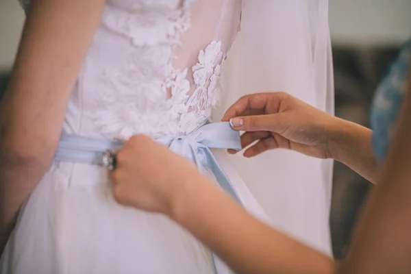 Morning beautiful bride gets dressed