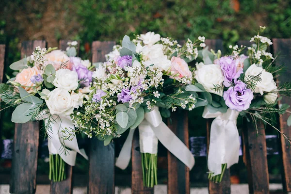 Wedding bouquets on a bench