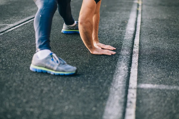 Man stretches before running