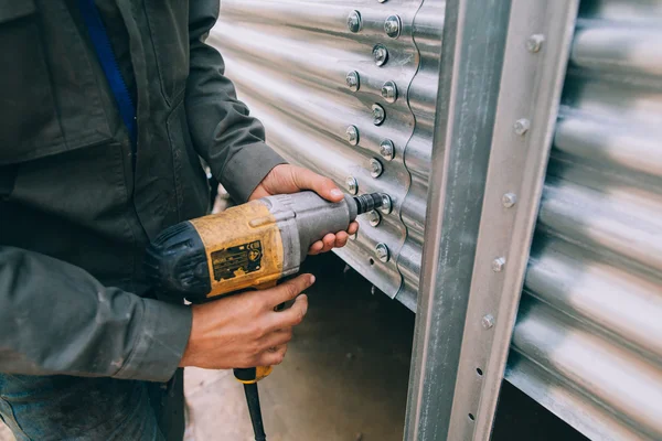 Man working with drill