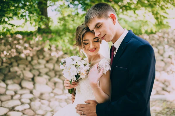 Newlyweds on a wedding walk