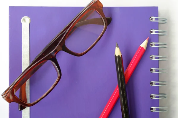 Color pencil and glasses.