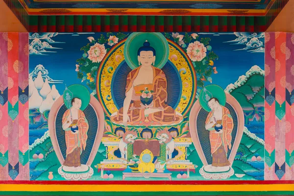 The traditional buddha painting art on the temple wall in Leh, Ladakh, India.