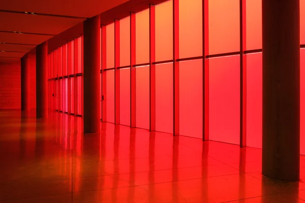 Red glass wall inside Seattle City Hall