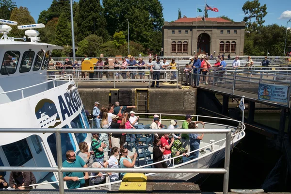 Tour boat with tourist lifted Ballard Locks