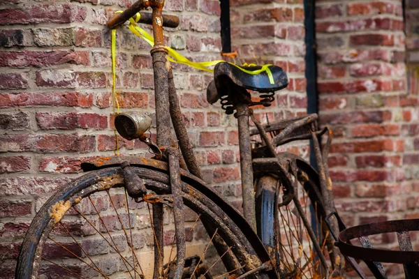 Rusty bicycle in vintage tone
