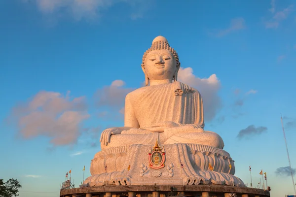 White big Buddha on hilltop