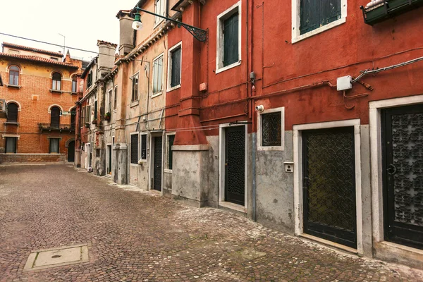 Historical street and houses in Venice, Italy