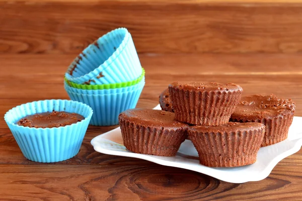 Chocolate cupcakes. Delicious homemade cupcakes. Sweet pastries. Baking molds. Chocolate cupcake in a mold