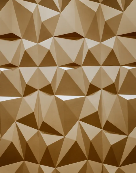 Abstract wallpaper or geometrical background consisting of warm or orange geometric shapes: triangles and polygons.