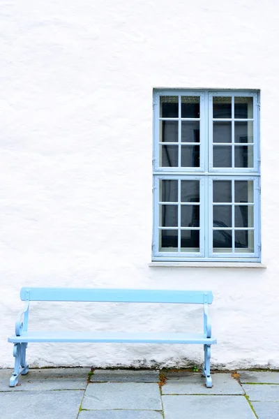 Light blue bench and window