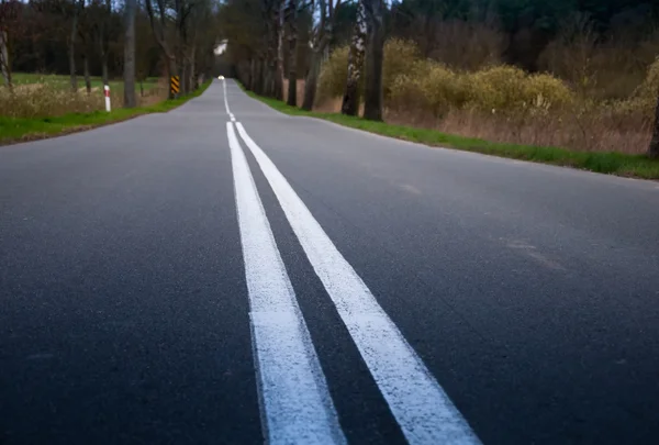 A roadway stretches off into the distance