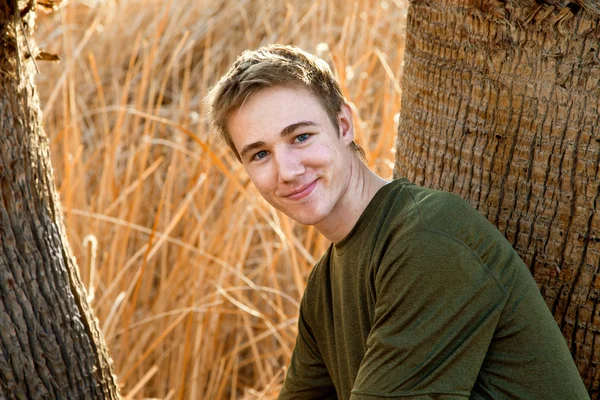 Portrait of a Teen Boy in Green