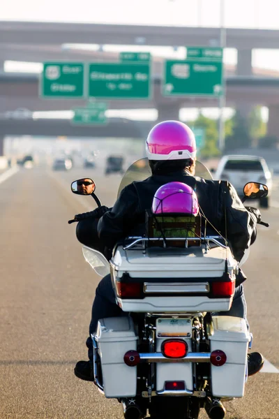 Father Daughter Riding Motorcycle On Freeway