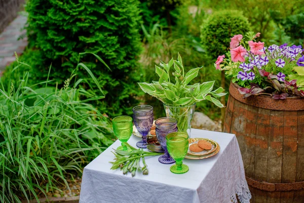 Serving table for two in the lush garden
