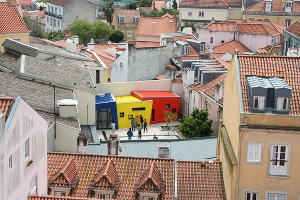 Colored houses on the roofs.