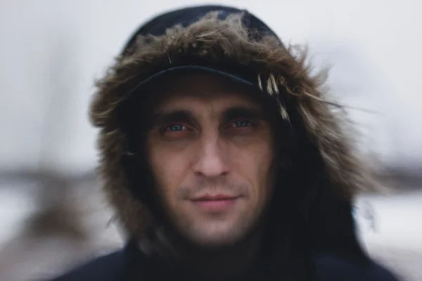 Portrait of a man in winter, close up