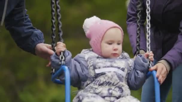 http://st2.depositphotos.com/8536802/12363/v/450/depositphotos_123636790-stock-video-young-happy-family-at-playground.jpg
