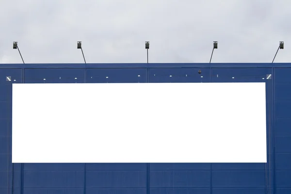 Mock up. Empty horizontal billboard screen on the blue wall.