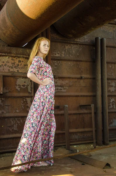 Girl wearing long dress on the ship