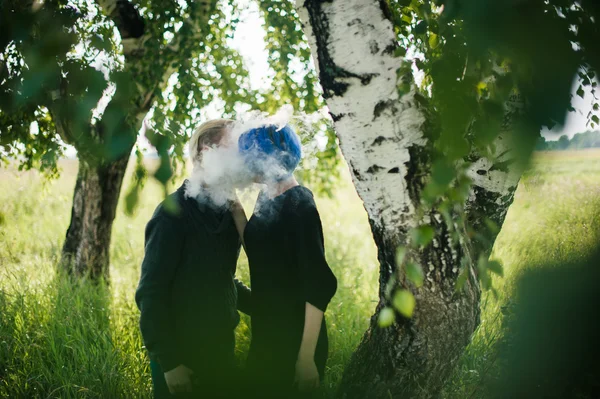 Man and woman with dyed hair romantically spend time in nature. romantic couple in love outdoors