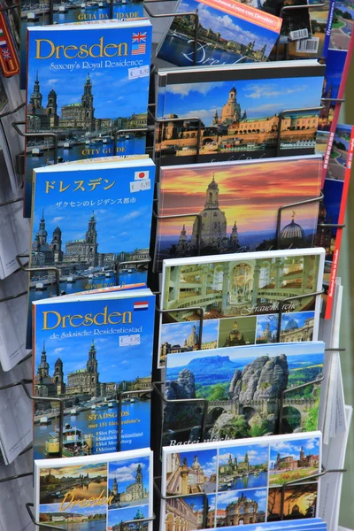 Guidebooks and postcards of city Dresden in Germany
