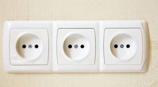 Electric power socket on a wall