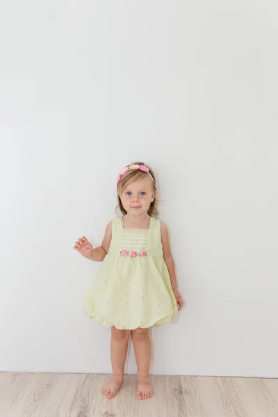 Beautiful little girl in a pretty dress