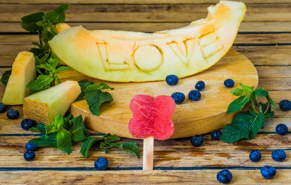 The melon is carved the word love