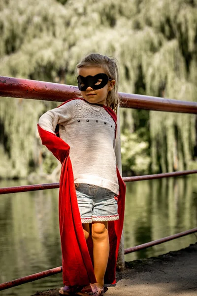 Little girl in the image of a super hero