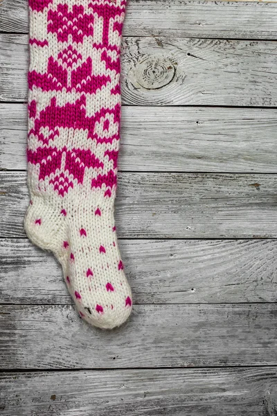 Warm knitted Christmas socks with beautiful pattern