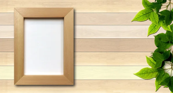 Simple photo frame on wood background