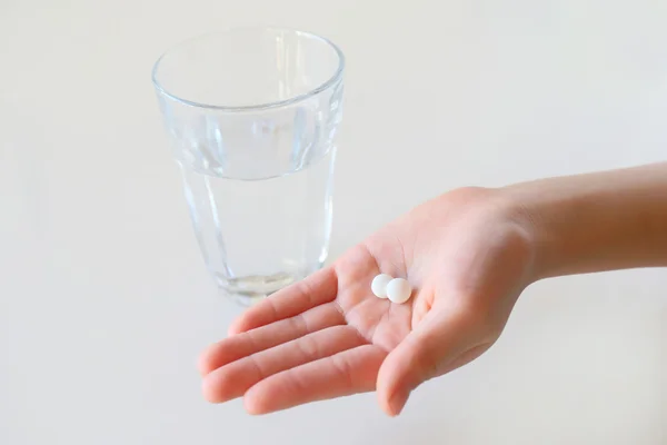 Hands and water with a medicine