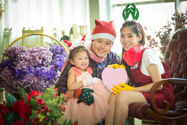 Family with little girl on A special gift.