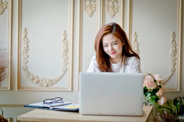 Woman  with laptop watching  drama movie