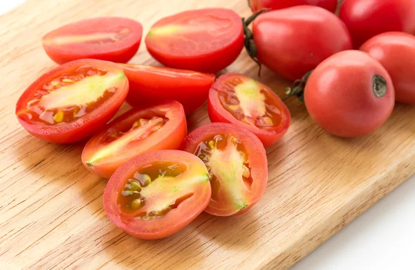 Cherry tomatoes on white background