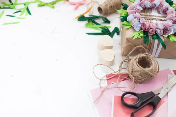 Preparation for the holiday. Packaging of gifts in bright paper.