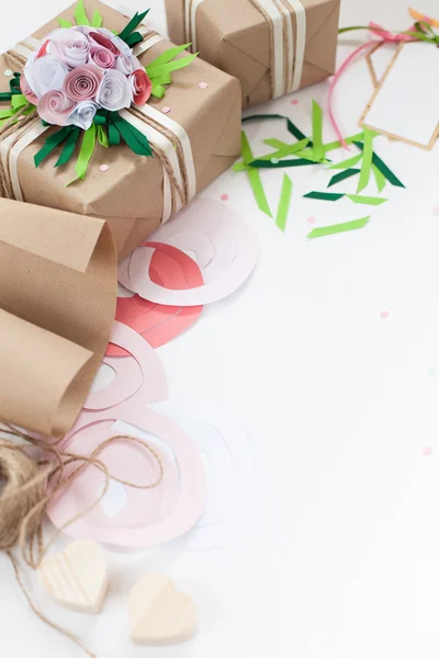 Preparation for the holiday. Packaging of gifts in bright paper.