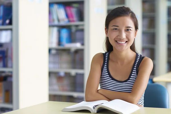 One female college student study in the library