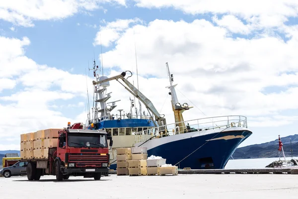 Trabsportation ship and truck with blue sky.