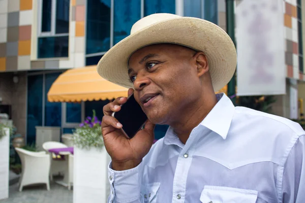 Black man talking on the phone