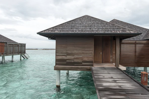 Maldives. Villa piles on water stock photo